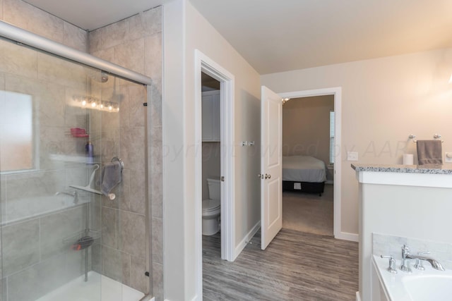 1839 Montaluse Rd, Amarillo, TX 79118 - ensuite bathroom featuring a stall shower, wood finished floors, a bath, and vanity