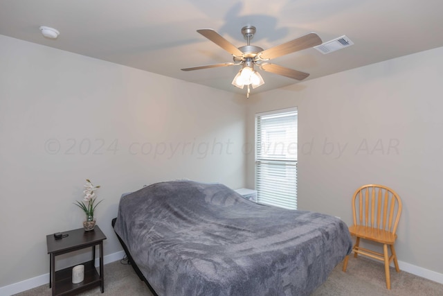 1839 Montaluse Rd, Amarillo, TX 79118 - carpeted bedroom with baseboards and a ceiling fan