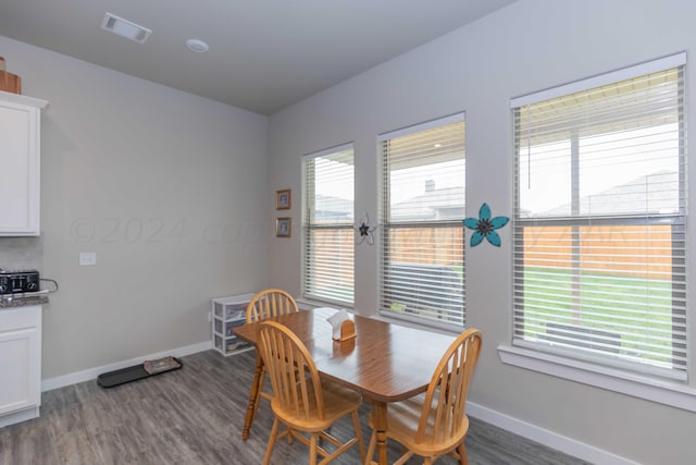 1839 Montaluse Rd, Amarillo, TX 79118 - dining room featuring dark wood-style flooring and baseboards