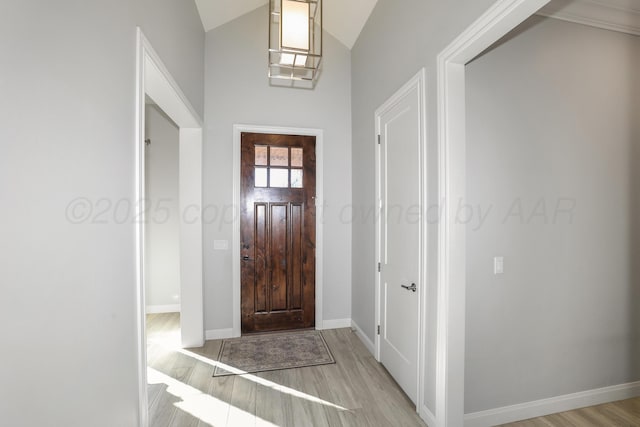 6201 Bay Rdg, Amarillo, TX 79119 - entrance foyer with light wood-style flooring and lofted ceiling