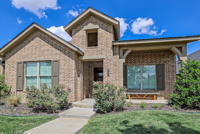 6201 Bay Rdg, Amarillo, TX 79119 - view of front of home with brick siding and a front lawn