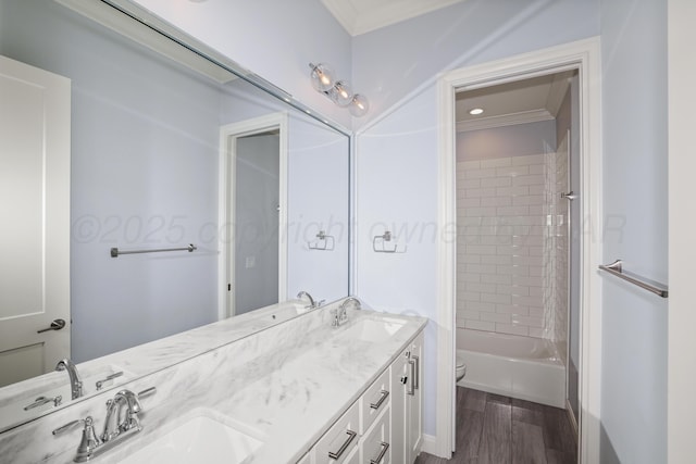 6201 Bay Rdg, Amarillo, TX 79119 - bathroom with double vanity, ornamental molding, wood finished floors, and shower / tub combination