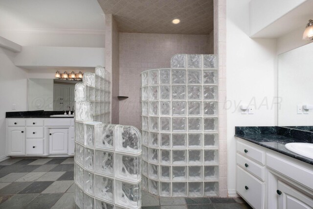 121 Quail Blvd, Amarillo, TX 79124 - full bathroom with walk in shower, two vanities, and tile patterned floors