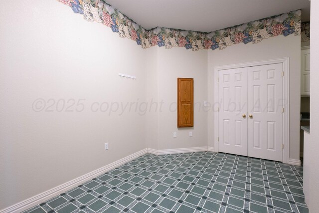 121 Quail Blvd, Amarillo, TX 79124 - unfurnished room featuring baseboards and tile patterned floors