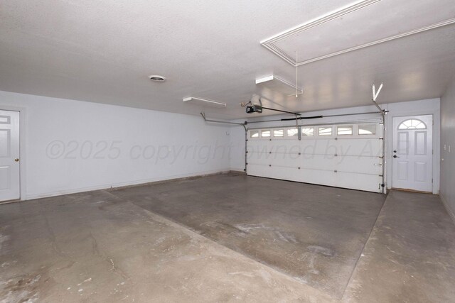 121 Quail Blvd, Amarillo, TX 79124 - garage featuring a garage door opener
