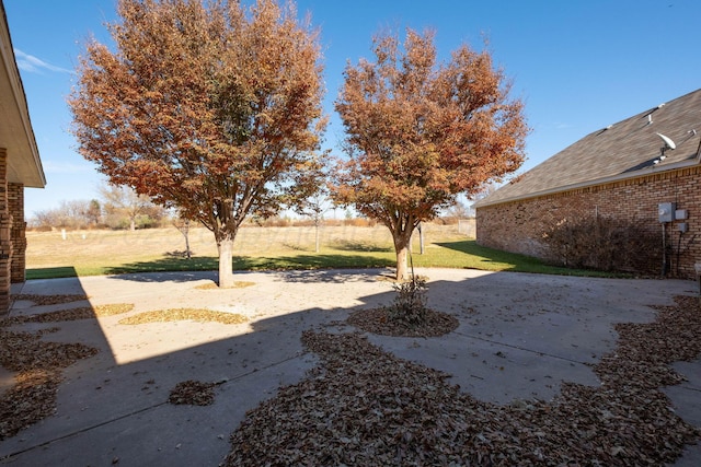 121 Quail Blvd, Amarillo, TX 79124 - view of grassy yard featuring a patio