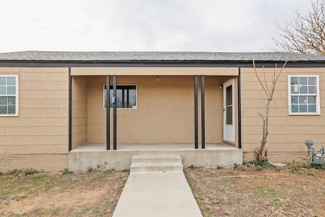 1308 Haggard St, Borger, TX 79007 - property entrance featuring a shingled roof