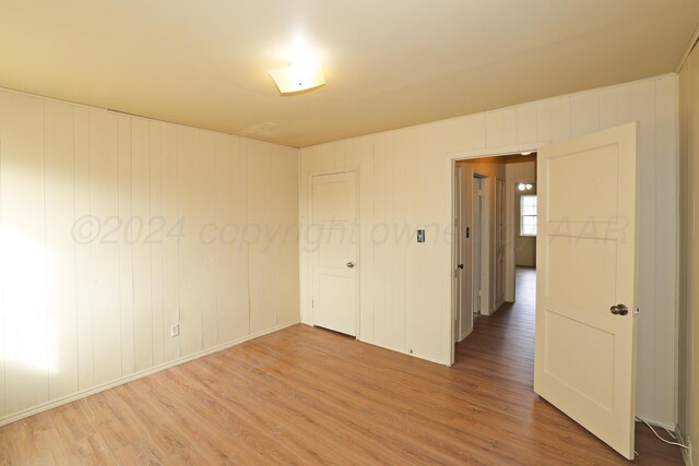 1308 Haggard St, Borger, TX 79007 - empty room featuring light wood finished floors
