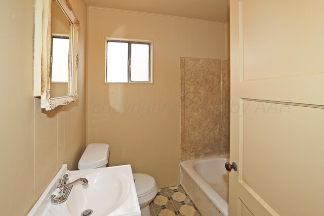 1308 Haggard St, Borger, TX 79007 - full bathroom with a sink, tile patterned floors, and toilet