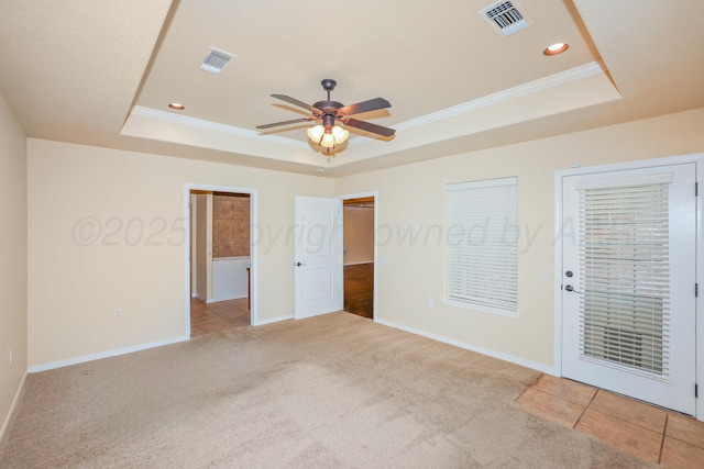 8403 Irvington Ct, Amarillo, TX 79119 - carpeted empty room with a tray ceiling, a ceiling fan, baseboards, ornamental molding, and recessed lighting