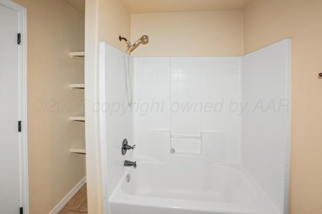 8403 Irvington Ct, Amarillo, TX 79119 - full bathroom featuring shower / bath combination and baseboards