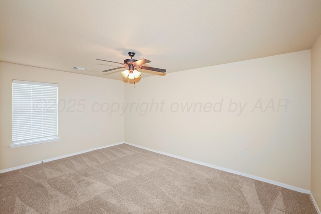 8403 Irvington Ct, Amarillo, TX 79119 - unfurnished room with light carpet, baseboards, and ceiling fan