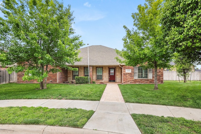 8403 Irvington Ct, Amarillo, TX 79119 - view of front of house with brick siding and a shingled roof