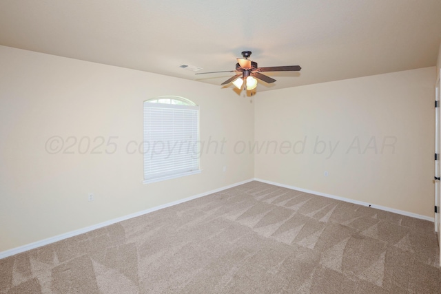 8403 Irvington Ct, Amarillo, TX 79119 - spare room featuring carpet floors, a ceiling fan, and baseboards