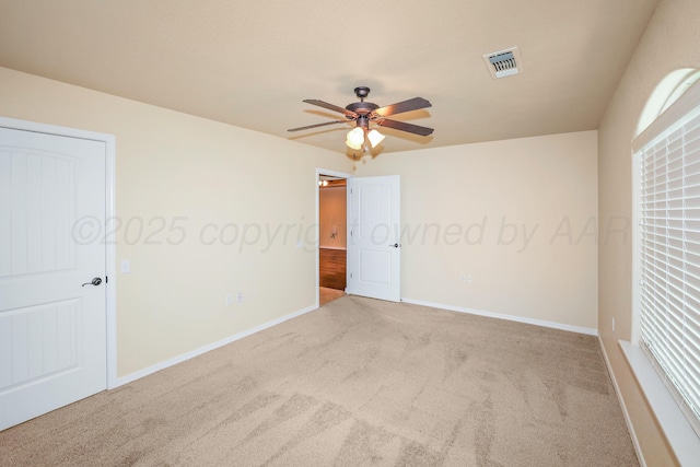 8403 Irvington Ct, Amarillo, TX 79119 - unfurnished bedroom with carpet, baseboards, and a ceiling fan