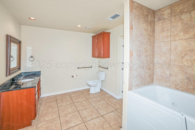 8403 Irvington Ct, Amarillo, TX 79119 - full bath featuring toilet, tile patterned flooring, baseboards, vanity, and recessed lighting