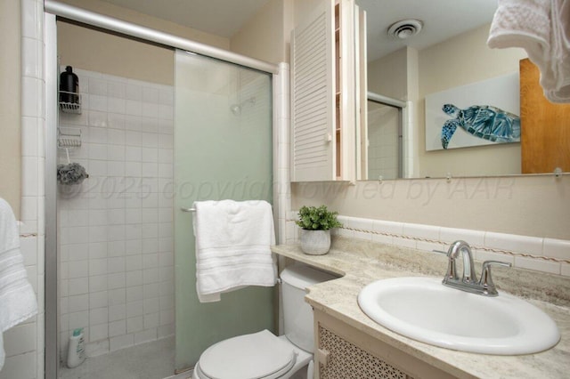 2819 Lloyd Dr, Amarillo, TX 79110 - bathroom with a shower stall, toilet, and vanity