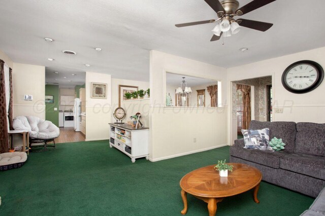 2819 Lloyd Dr, Amarillo, TX 79110 - living area featuring carpet flooring, a chandelier, a ceiling fan, and baseboards
