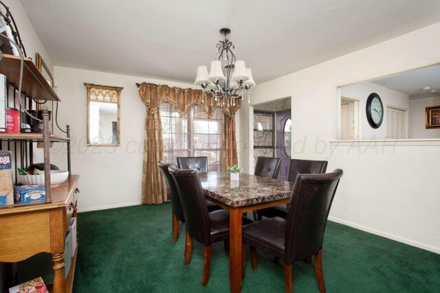 2819 Lloyd Dr, Amarillo, TX 79110 - carpeted dining space featuring a chandelier and baseboards