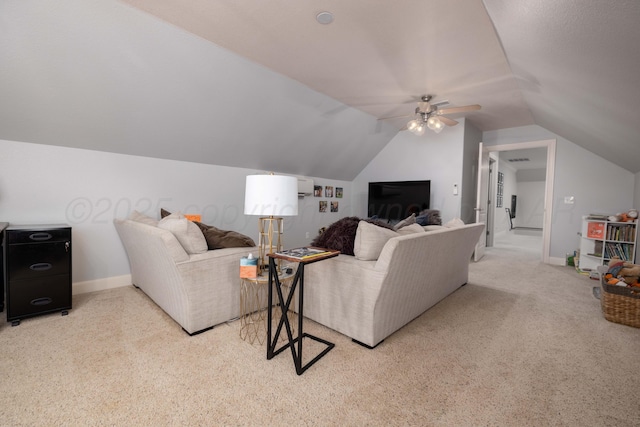 carpeted living room with ceiling fan, baseboards, and lofted ceiling