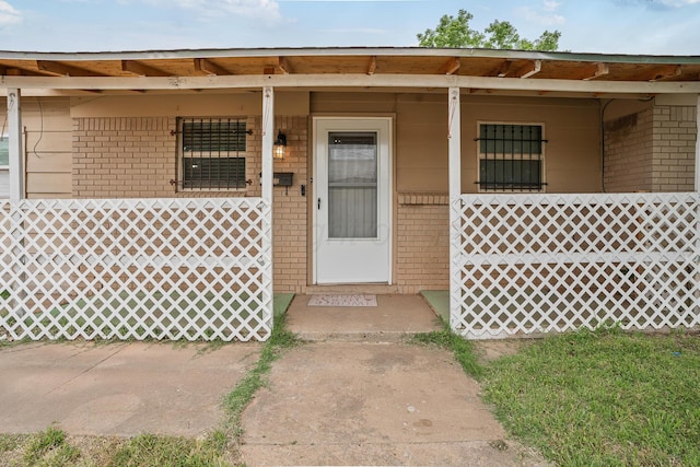 3515 NE 19th Ave, Amarillo, TX 79107 - entrance to property with brick siding and a porch