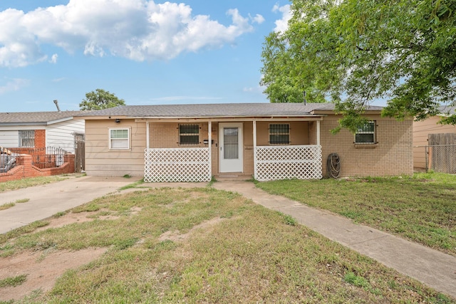 3515 NE 19th Ave, Amarillo, TX 79107 - view of front of house featuring covered porch and brick siding