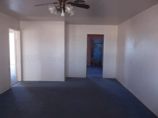 unfurnished room with ceiling fan