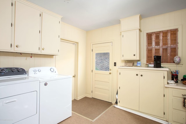 1219 S Rusk St, Amarillo, TX 79102 - laundry room featuring washer and dryer, cabinet space, and light carpet