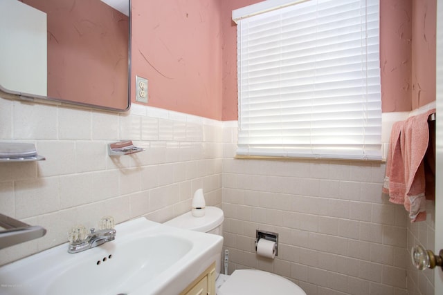 1219 S Rusk St, Amarillo, TX 79102 - half bathroom with tile walls and vanity