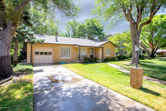 1219 S Rusk St, Amarillo, TX 79102 - ranch-style house with an attached garage, concrete driveway, a front yard, brick siding, and a shingled roof