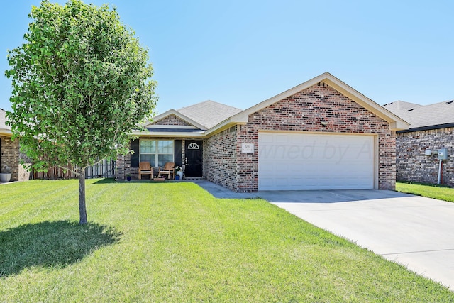 5001 Gloster St, Amarillo, TX 79118 - view of front of home with a garage, brick siding, concrete driveway, a front lawn, and roof with shingles