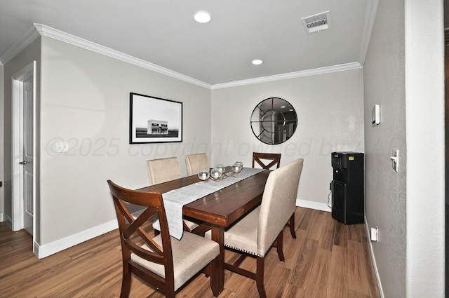5001 Gloster St, Amarillo, TX 79118 - dining area featuring ornamental molding, baseboards, wood finished floors, and recessed lighting