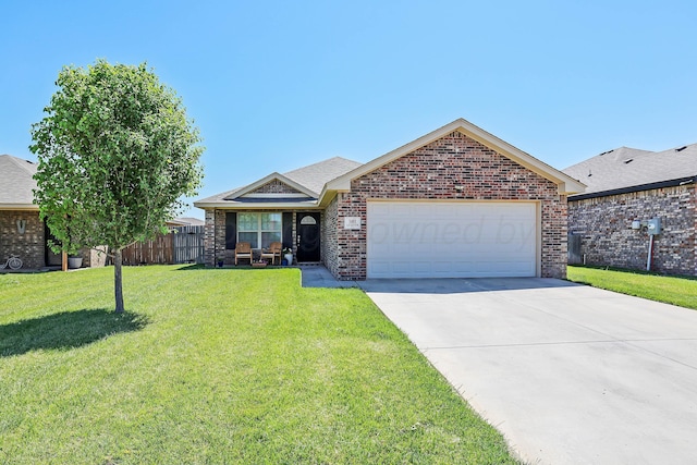 5001 Gloster St, Amarillo, TX 79118 - single story home with a garage, brick siding, and concrete driveway