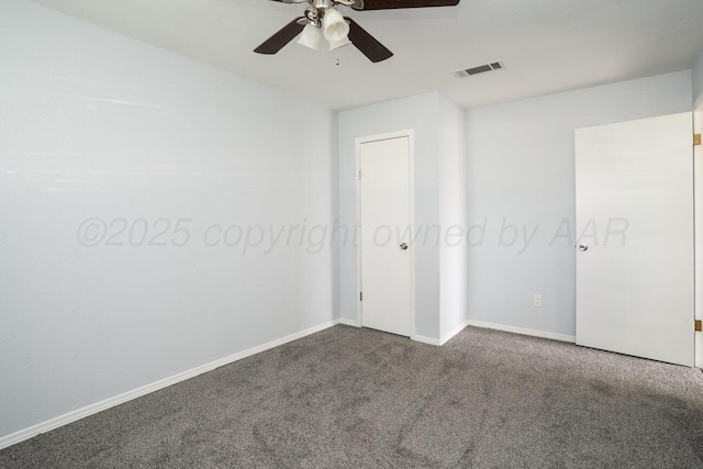 5101 Pin Oak Dr, Amarillo, TX 79110 - unfurnished bedroom featuring dark carpet and ceiling fan