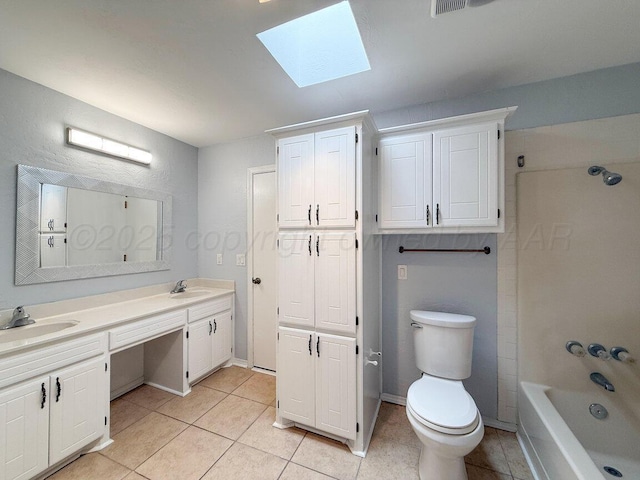 5101 Pin Oak Dr, Amarillo, TX 79110 - bathroom featuring a skylight, tile patterned flooring, double vanity, and bathing tub / shower combination