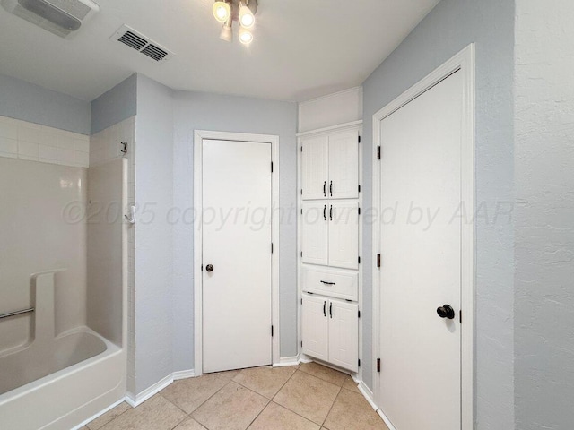 5101 Pin Oak Dr, Amarillo, TX 79110 - bathroom featuring tile patterned flooring and  shower combination