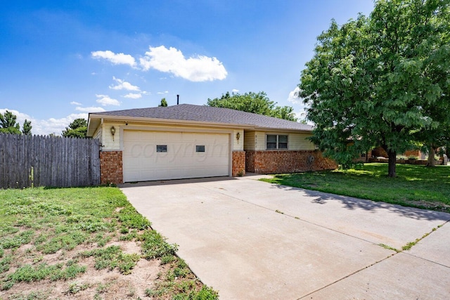 5101 Pin Oak Dr, Amarillo, TX 79110 - ranch-style home with brick siding, a garage, and concrete driveway