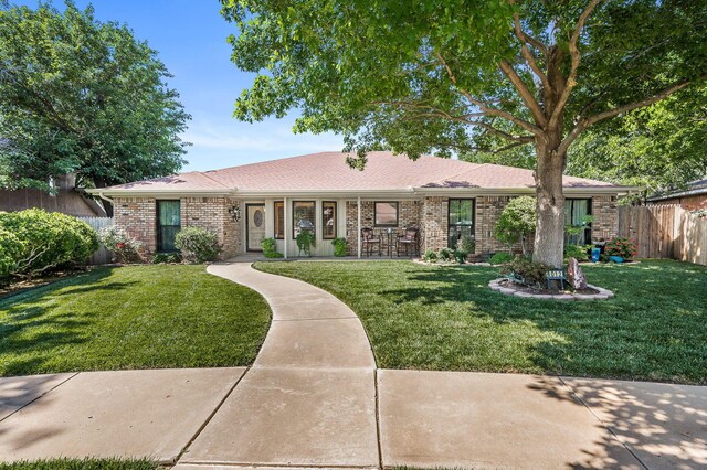 4012 Linda Dr, Amarillo, TX 79109 - ranch-style home with brick siding and roof with shingles