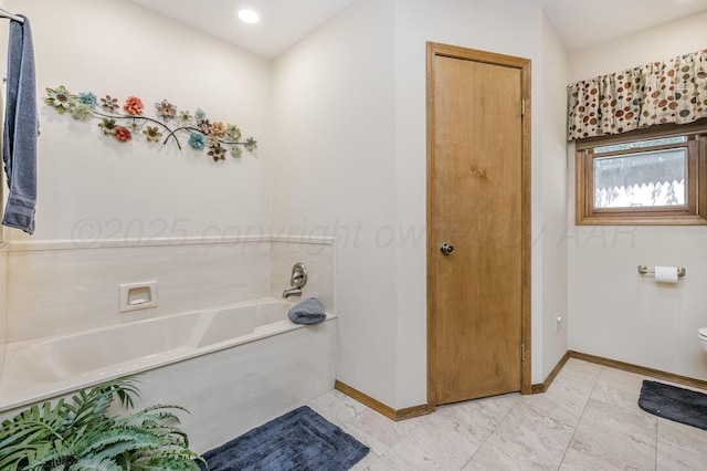 4012 Linda Dr, Amarillo, TX 79109 - full bath featuring baseboards and a bath