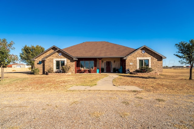 single story home with a front yard