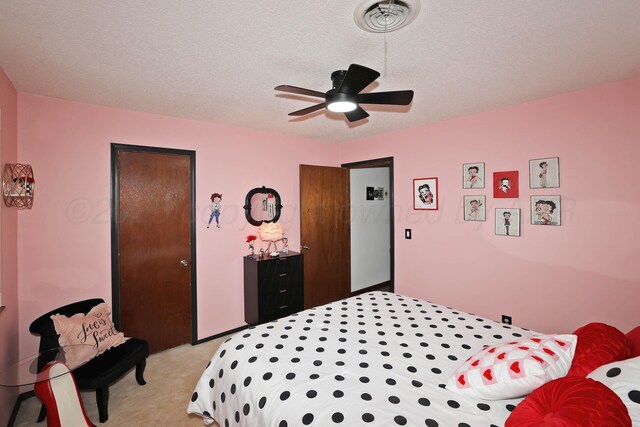 7303 Jameson Dr, Amarillo, TX 79121 - bedroom with light carpet, a textured ceiling, and ceiling fan