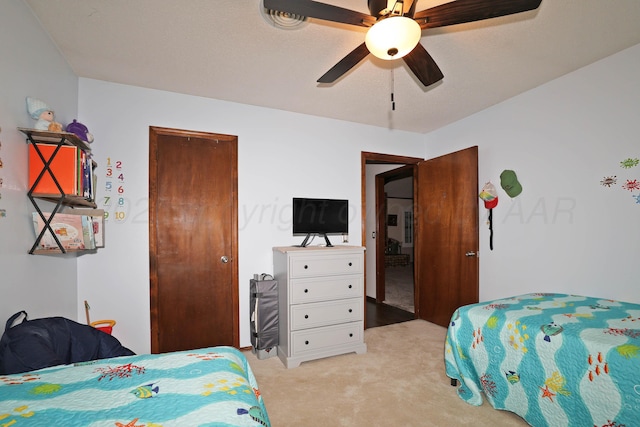 7303 Jameson Dr, Amarillo, TX 79121 - bedroom featuring light carpet and ceiling fan