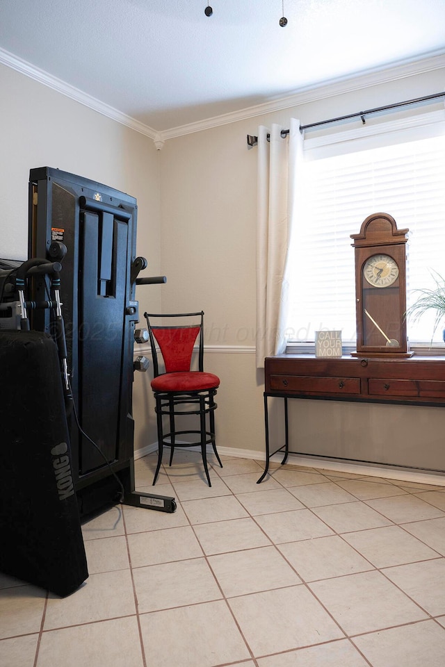 1100 Mills Ave, Dumas, TX 79029 - misc room with ornamental molding and light tile patterned floors