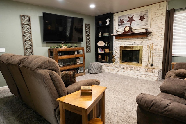 1100 Mills Ave, Dumas, TX 79029 - carpeted living room featuring a brick fireplace, built in features, and recessed lighting