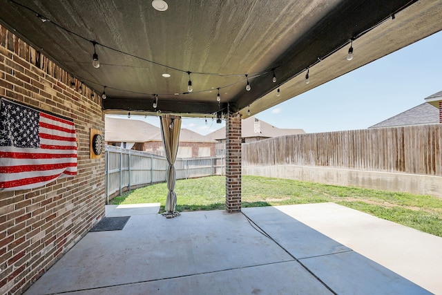 6702 Tatum Cir, Amarillo, TX 79119 - fenced backyard featuring a patio area