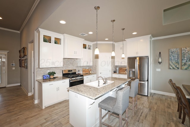 6702 Tatum Cir, Amarillo, TX 79119 - kitchen featuring stainless steel appliances, tasteful backsplash, ornamental molding, white cabinetry, and recessed lighting