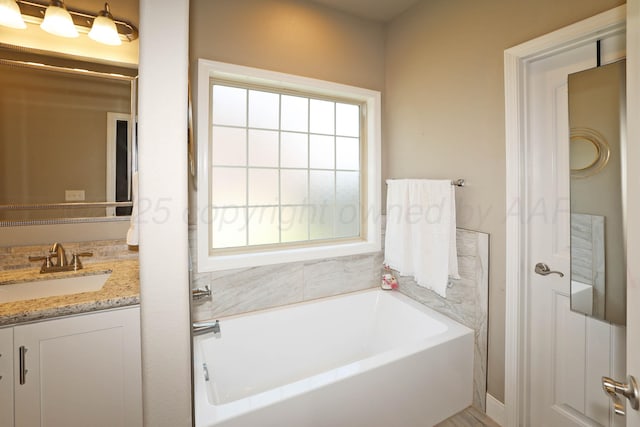 6702 Tatum Cir, Amarillo, TX 79119 - full bath featuring a bath and vanity