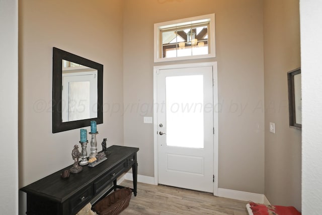 6702 Tatum Cir, Amarillo, TX 79119 - foyer with light wood-style floors and healthy amount of natural light