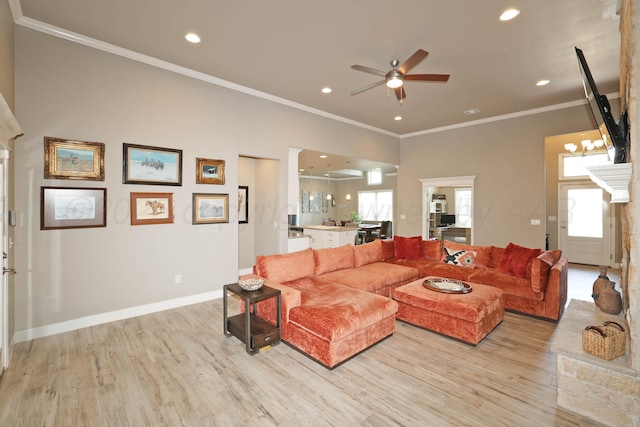 6702 Tatum Cir, Amarillo, TX 79119 - living area with ornamental molding, a ceiling fan, light wood finished floors, and recessed lighting