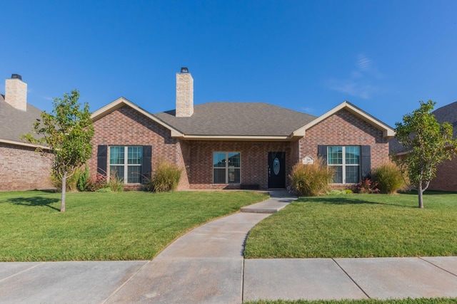 ranch-style house with a front yard